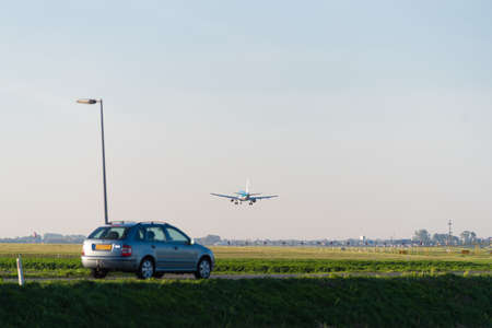 AMSTERDAM, NETHERLANDS - OCTOBER 13, 2018: Blue with white Royal Dutch KLM airplane just before its...