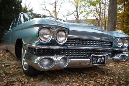 USSELO, NETHERLANDS - OCTOBER 21, 2018: Front view of a blue cadillac sedan de Ville at an oldtimer...