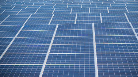 solar park in the Netherlands with some electricity pylons in the background