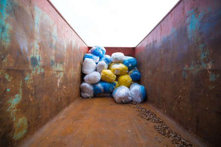 large sea container with plastic waste