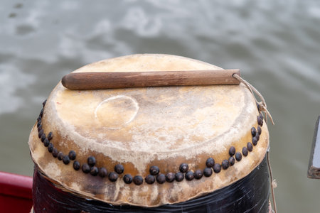 dragon boat drum. A dragon boat is a human powered watercraft originating from the Pearl River Delta region of China's southern Guangdong province.の写真素材