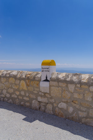 marker stone on top of the Mont Ventoux, France. At 1,909 m (6,263 ft), it is the highest mountain in the region and has been nicknamed the "Beast of Provence".の写真素材