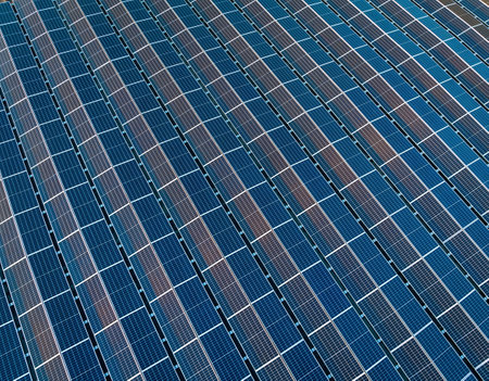 industrial warehouse with roof loaded with solar panels