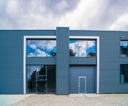exterior of a modern warehouse with office unitの写真素材