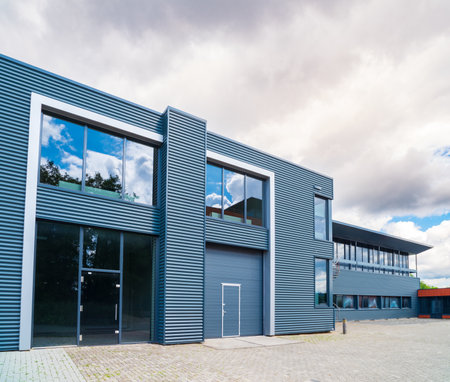 exterior of a modern warehouse with office unitの写真素材