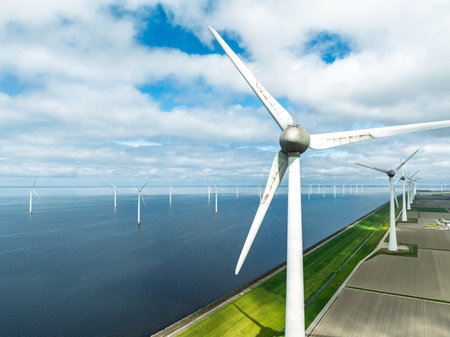 aerial view of a wind farm in a lake in the netherlandsの写真素材