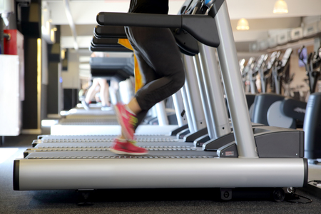 Training on the treadmill in the gym