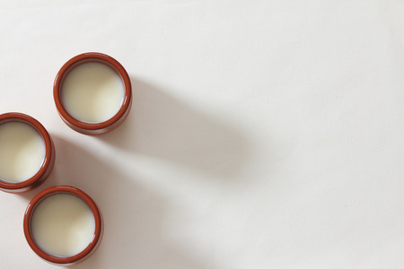 Homemade yoghurt on a white tableclothの写真素材