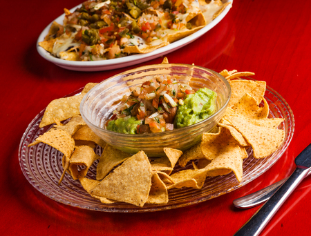 Mexican food: guacamole with nachosの写真素材