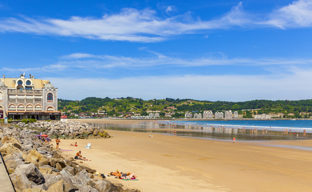 HENDAYE, FRANCE - JUNE 8: Tourists and surfers enjoy the beach of the charming seaside resort of Hendaye on June 8, 2017.のeditorial素材