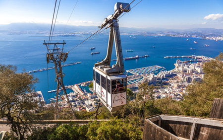 GIBRALTAR - NOVEMBER 16, 2017: The cable car that connects the city of Gibraltar with the top of the rock arrives at the station.のeditorial素材