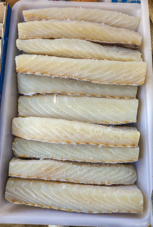 Dried salted cod or bacalao at a market stall.