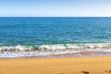 Idyllic beach with tuquoise sea and golden beach.