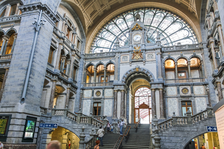 ANTWERP, BELGIUM - AUGUST 4, 2011: Interior of Antwerp main railway station in Antwerp, Belgium. The station was built between 1895 and 1905.のeditorial素材