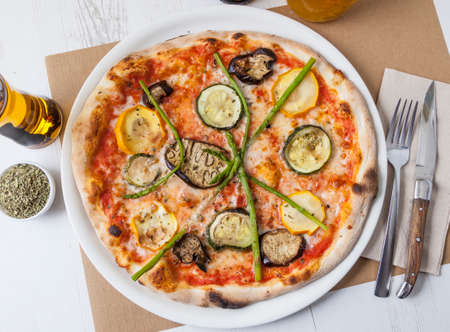 Vegetarian pizza with courgette, aubergine and green asparagus.の写真素材
