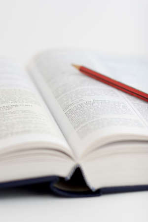 open book and pen with very shallow depth of fieldの写真素材