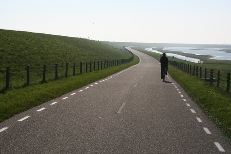  Cyclists in the Netherlands at the dikeの写真素材