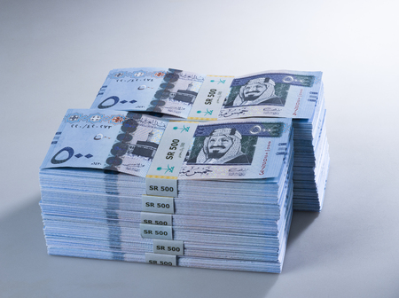 Stacks of Saudi Riyal Banknotes of 500 with image of King Abdulaziz Closeup
