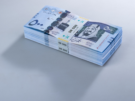 Pile of Saudi Riyal Banknotes of 500 with image of King Abdulaziz Closeup