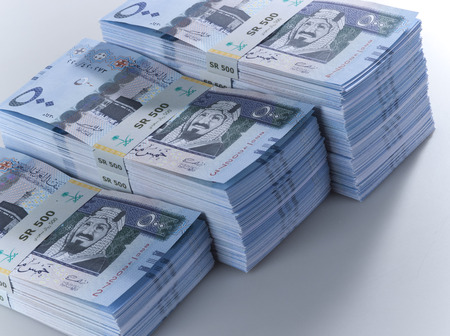 Stacks of Saudi Riyal Banknotes of 500 with image of King Abdulaziz Closeup