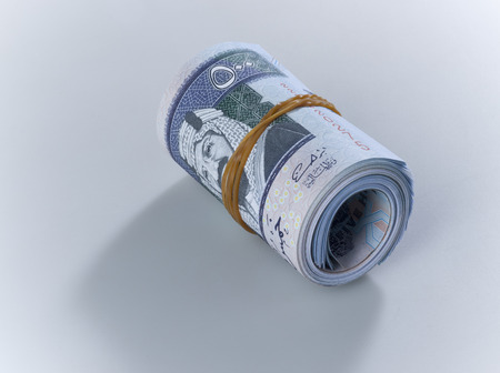 Roll of Saudi Riyal Banknotes of 500 with image of King Abdulaziz close upの写真素材