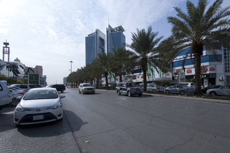 Tahlia Street with Shops, Cafe's and people, Riyadh, Saudi Arabia, 01.12.2016のeditorial素材