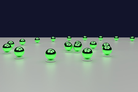 3D rendering of an assembly of glossy balls on a white surfaceの写真素材