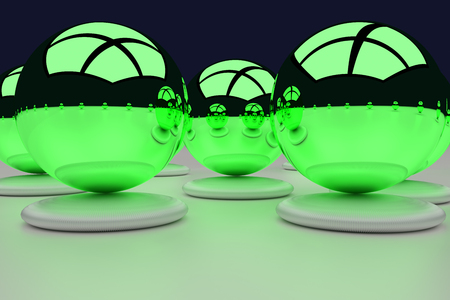3D rendering of an assembly of glossy balls on a white surfaceの写真素材