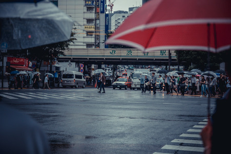 People umbrella and rain in Shibuya, Japan