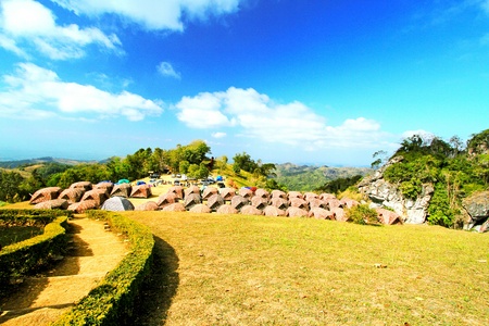 Many tent are at Sri Nan national park, Thailand. Travel and Camping with blue sky and clouds on the mountainの写真素材