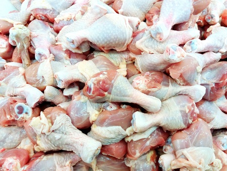 Close up many chicken drumstiks on the supermarket. Fresness food concept.の写真素材
