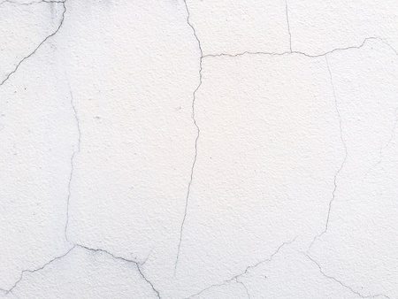 Close up cracked white or gray wall background.の写真素材