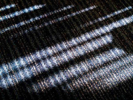 Pattern of sunlight and light & Dark on green rug floor - Abstract and Art background conceptの写真素材