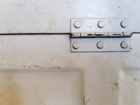 Close up old steel white door or window hinge with copy space - Vintage and Retro object conceptの写真素材