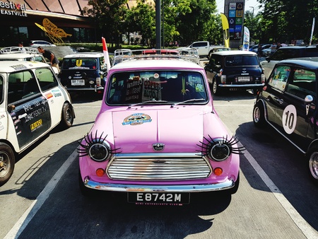 Bangkok, Thailand - May 21, 2018: Cute pink mini Austin classic car parking on the road - Small and Vintage car conceptのeditorial素材