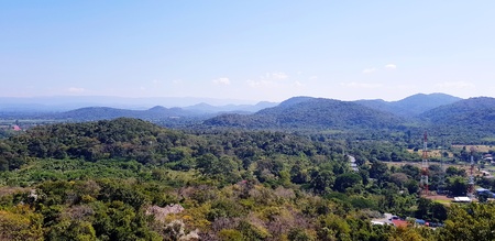 Beautiful Green forest or Jungle with mountain range, Clear blue sky and white clouds - Beauty...