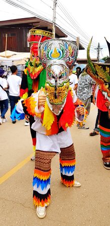 Loei, Thailand - July 6, 2019: Phi Ta Khon or Ghost festival in Thailand. Local people made and...