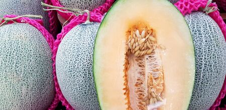 Close up fresh cantaloupe piece with for sale at fruit market - Diet food and Healthy eating styleの写真素材