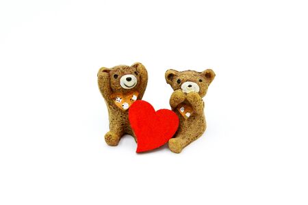 Cute two mini teddy bear with red heart isolated on white background. Valentine day and Couple lovely animal conceptの写真素材