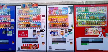 Yamanashi, Japan - February 23, 2019: Pattern of Colorful drinking vending machine installed on footpath, street or road, landmarks for service people and tourist. Food Technology and Electronicのeditorial素材