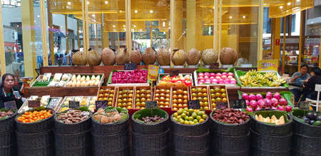 Chiang Mai, Thailand - December 21, 2018: Many fresh fruit (durian, orange dragon fruit, melon watermelon, mango, pineapple, tamarind, yam) for sale at freshness market or supermarket.のeditorial素材