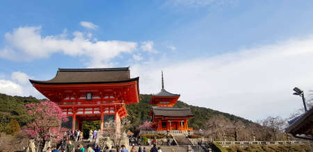 Many people or tourist travel to visited Kiyomizu temple with blue sky and clouds background with copy space. The famous place and Landmark in Japan. Beautiful building and Exterior designのeditorial素材