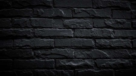 Black brick wall for background. Pattern of brickwork wallpaper and Construction building.の写真素材