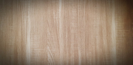 Brown wooden background. Wood panel wall or wallpaper with vignette.の写真素材