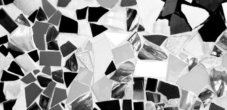 Mosaic tile floor for background. Art design wallpaper, Cracked, Shape and Abstract in black and white tone.  tile fragments on wall in monochrome style.の写真素材