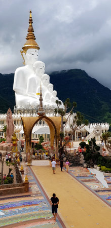 Many people respect, visited and travel to Wat Pha Sorn Kaew temple to see Big white monk statue. Religion, Faith and believe of Buddhism people. Famous place in north of Thailand.の写真素材