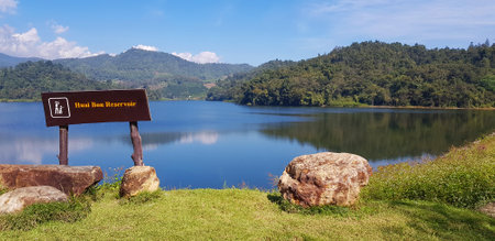 Landscape view of lake or river with green mountain hill and blue sky background at Huai Bon reservoir Chiang Mai, Thailand. Park, Beauty of nature and Natural wallpaper. Landmarkの写真素材