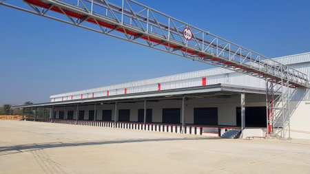Cargo or Warehouse for storage and transport of many parcels or shipping by mail with clear blue sky background and copy space. Place, office, building for distribution area, Import and Export goods.の写真素材