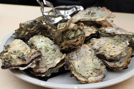 Japanese cuisine: grilled oysters in Miyajima, Hiroshima, Japanの写真素材