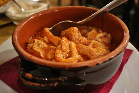 Italian cuisine: trippa (tripe) stewed in tomato sauce in Florence, Italy